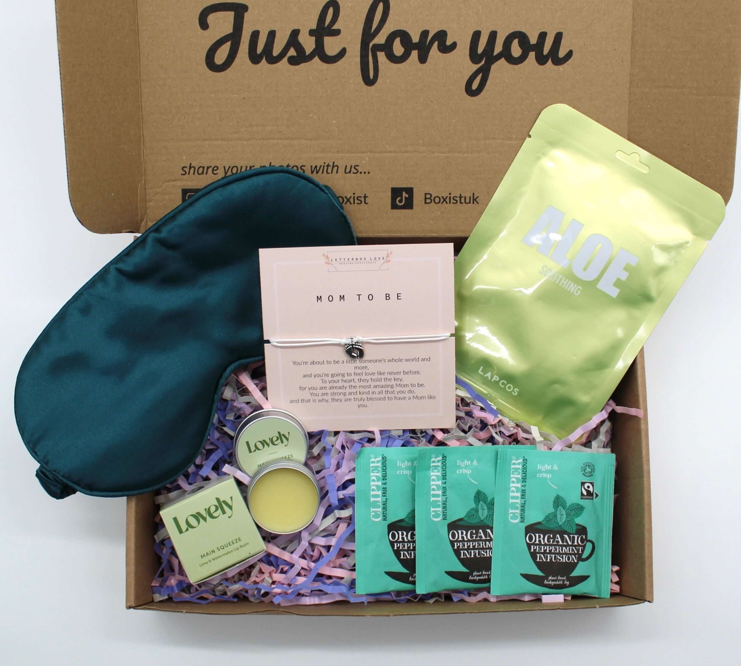 Mum to be gift box includes a cute bracelet with baby feet charm, satin sleep mask, main squeeze lip balm, aloe sheet mask, and 3 individually wrapped peppermint tea bags. 