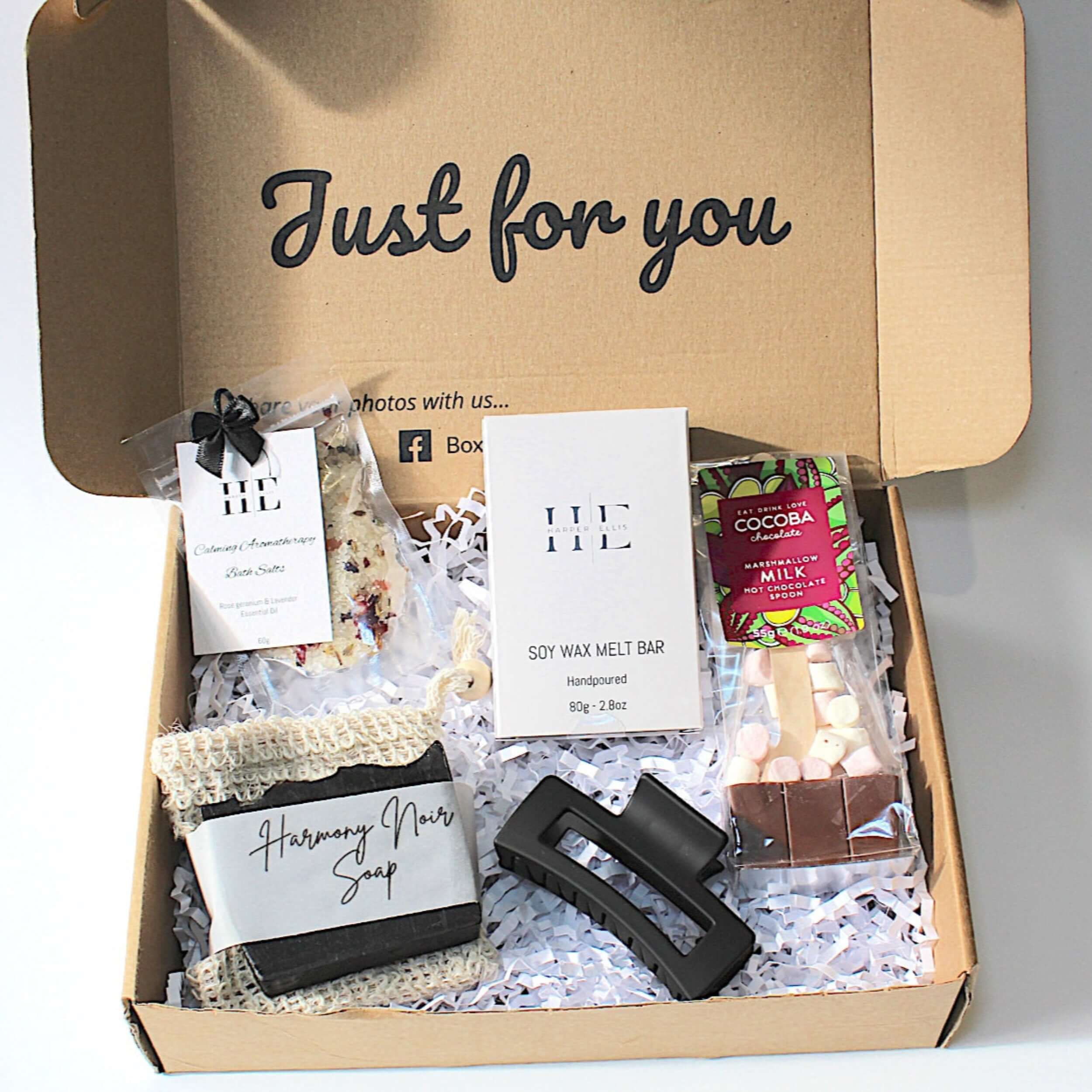 Relax and Unwind ready to go gift by Boxist, includes calming aromatherapy bath salts, aromatherapy soy wax melt bar, harmony noir soap bar with jute exfoliation bag, square claw clip for hair, and hot chocolate spoon.