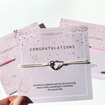 Congratulations bracelet to et them know how proud you are of their achievements. Build them a gift box to let them know.