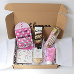 Cosy season gifting with cute ghost coaster, hydrating sheet mask, aromatherapy bath salts, strawberry bom boms, hot chocolate sachet and berries body butter