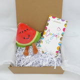Congrats Plush gift set featuring watermelon plush, congratulations card, and Colombian chocolate in gift box.