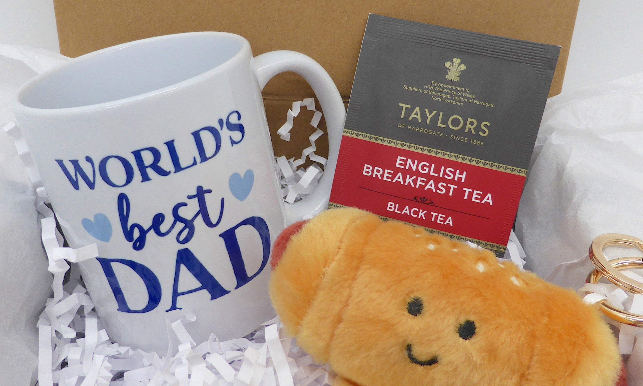 Gift set with 'World's Best Dad' mug, tea, and plush toy in a magnetic closure box box. Fathers day or Dads birthday 