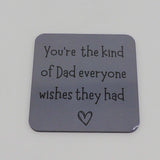 Gray coaster with text and heart on a gray background