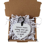 Ceramic keepsake white with black font saying distance means nothing when you have someone so special, Presented in craft gift box on white tissue paper. 