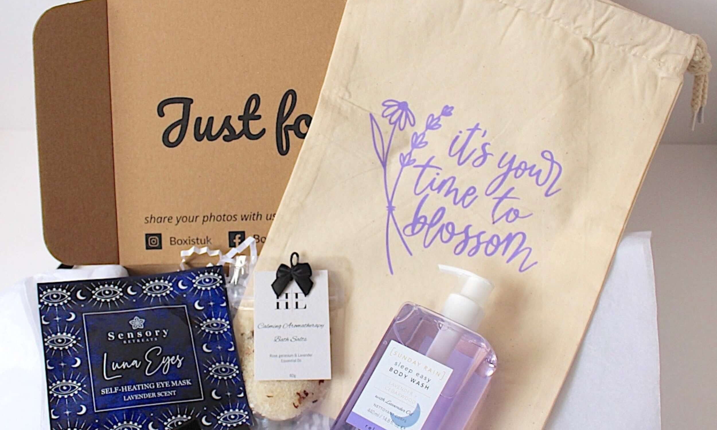 Gifting box with bath bombs, soap, and a drawstring bag 