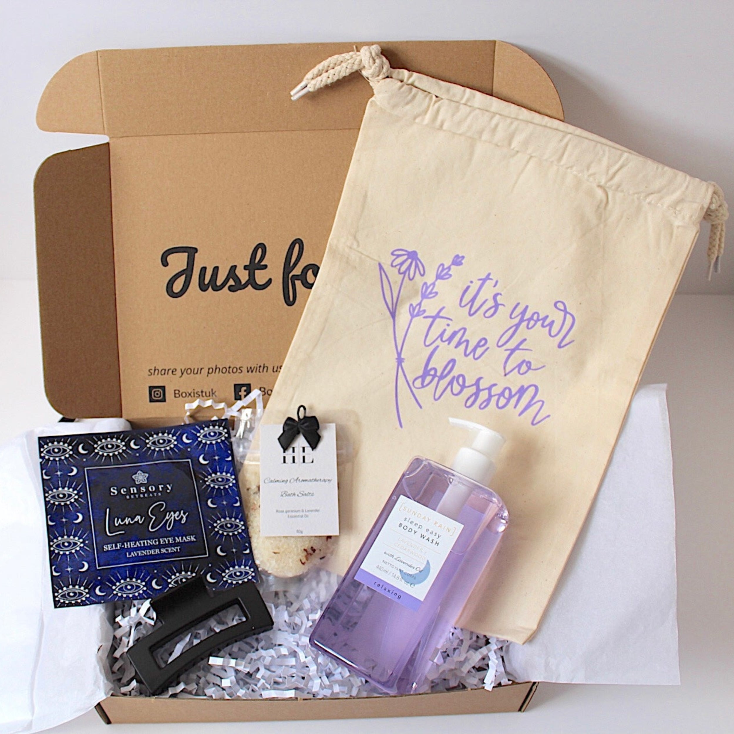 Gifting box with bath bombs, soap, and a drawstring bag 