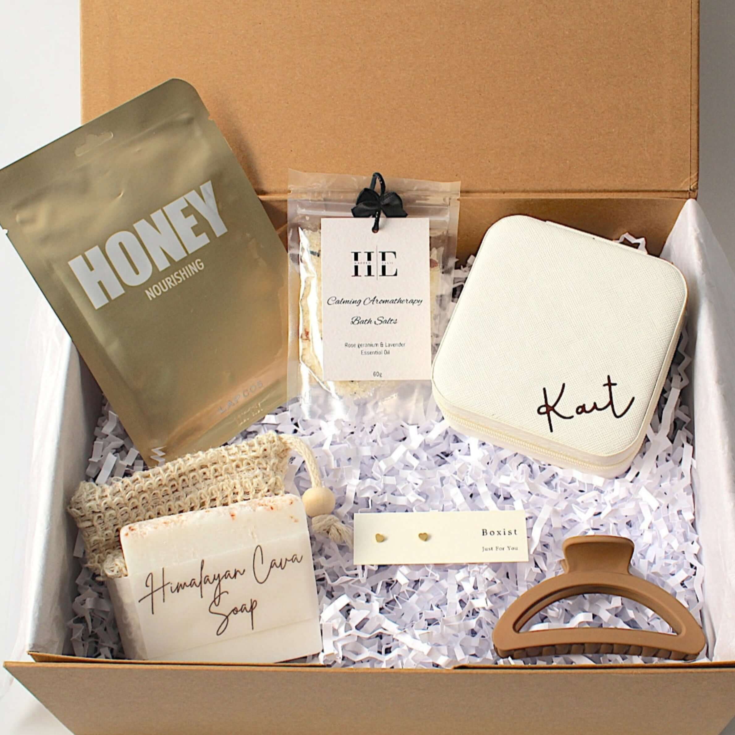 Jewellery box travel gift set, includes a travel jewellery gift box, nourishing sheet mask, calming aromatherapy bath salts, himalayan cava soap bar with jute exfoliation soap bag, gold plated heart earrings and hair clip.  