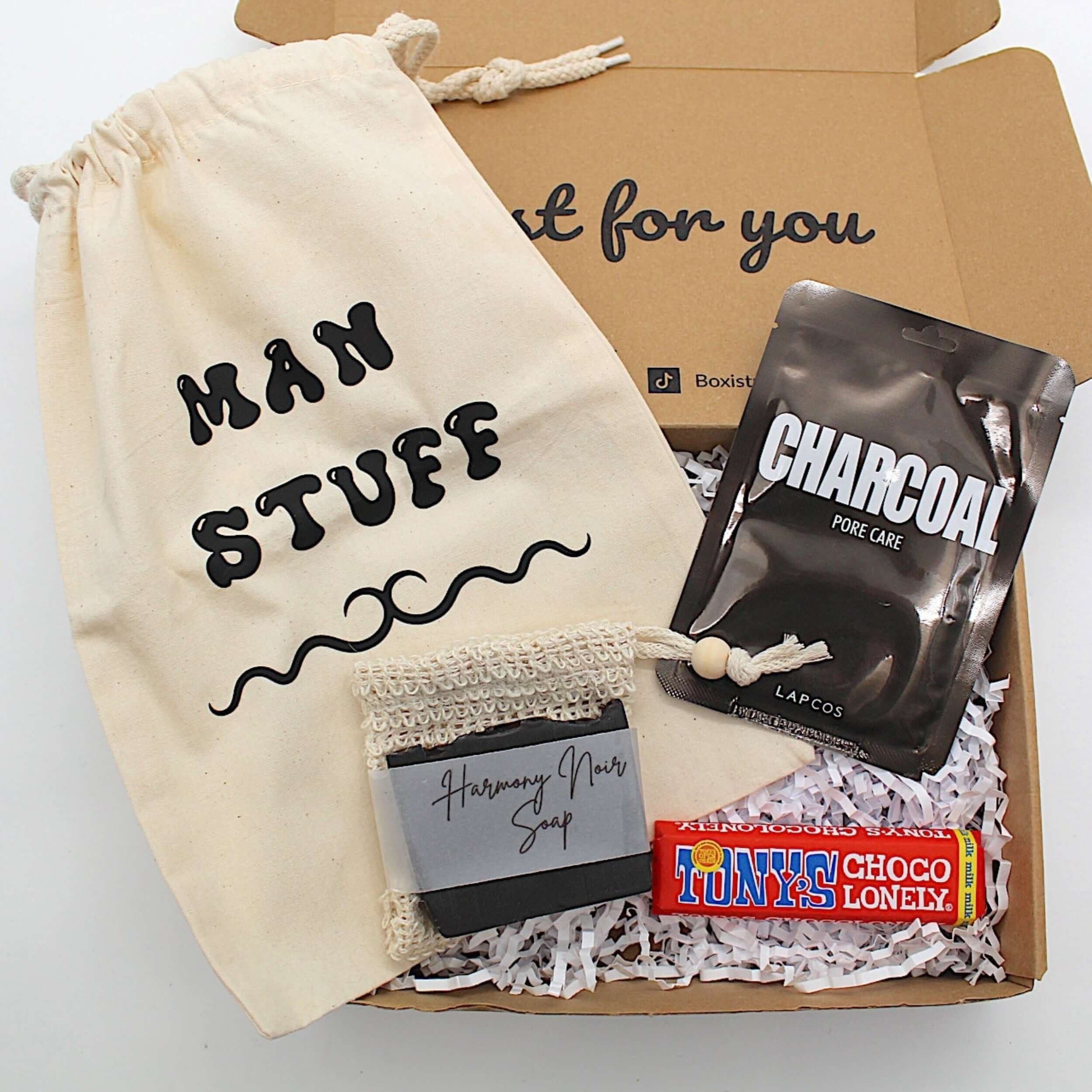 Man stuff wash bag,  harmony noir soap and jute bag, charcoal sheet mask and Tonys chocolate bar
