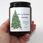 Personalised Christmas candle in an apothecary jar with a festive design and custom label.