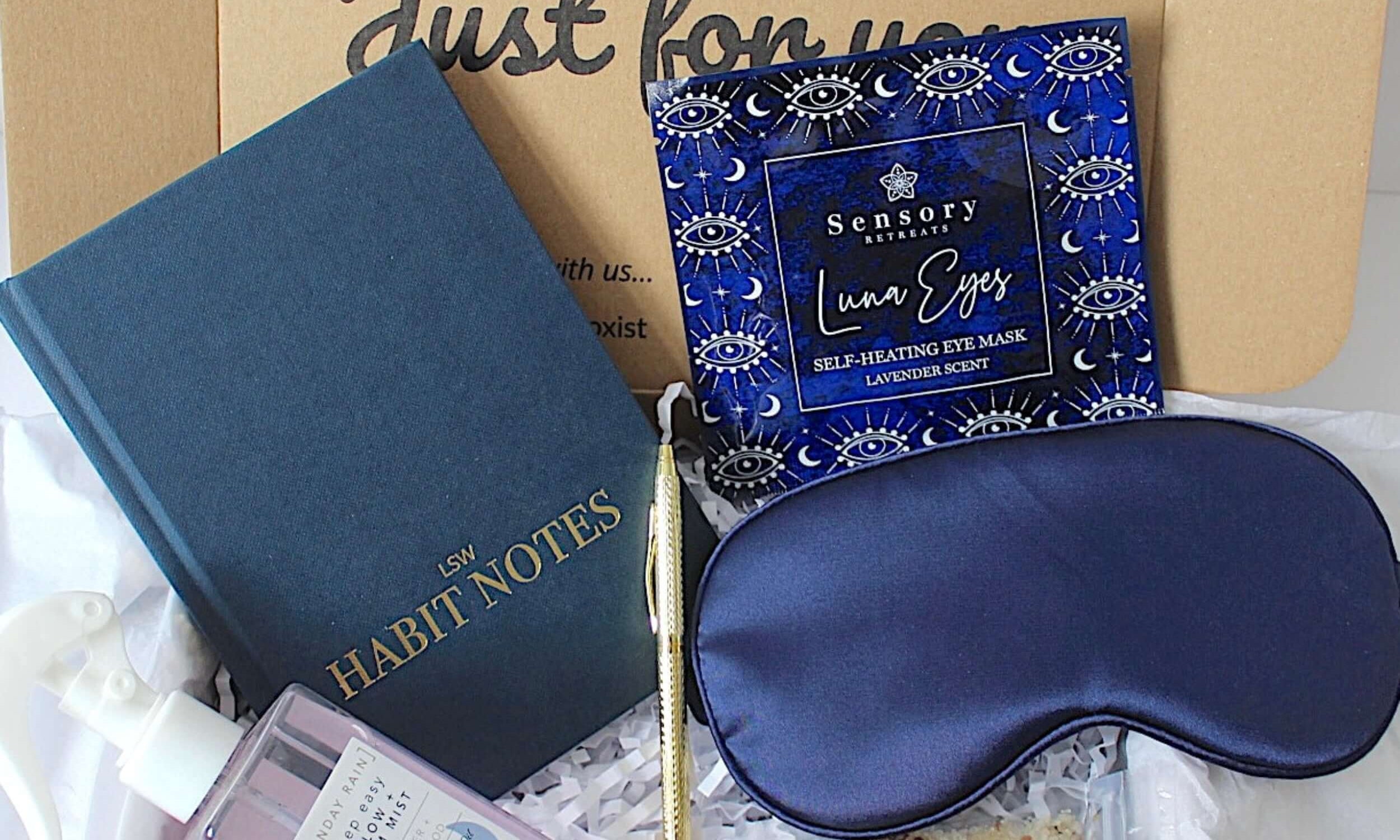 Sleep-themed gift set with eye mask, LSW Habit notes journal, and other items in a box.
