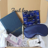 Sleep-themed gift set with eye mask, LSW Habit notes journal, and other items in a box.