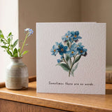 Card 6 x6 saying 'Sometimes there are no words" with forget me knot on front. Printed on textured card stock. 