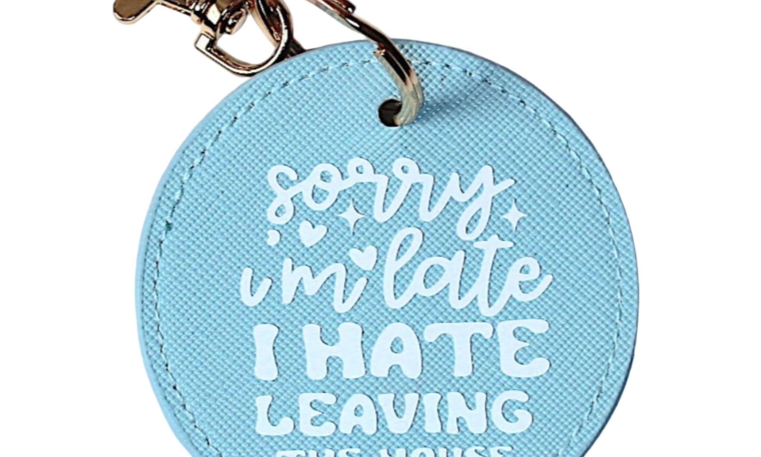 Light blue keychain with humorous text
