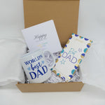 Best Dad Gift Set featuring coffee mug, chocolate bar, and greeting card in a gift box.