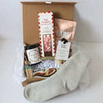 Cosy era luxury gift, cashmere socks, candle and self care treats 