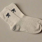 Cream Bow Wool Ladies Socks, add to your customised gift box perfect for any occasion. 