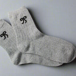 Grey bow knitted wool socks, add to your build your own gift box perfect for any occasion. 