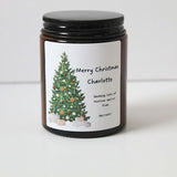 Personalised Christmas candle in an apothecary jar with festive Christmas tree design.